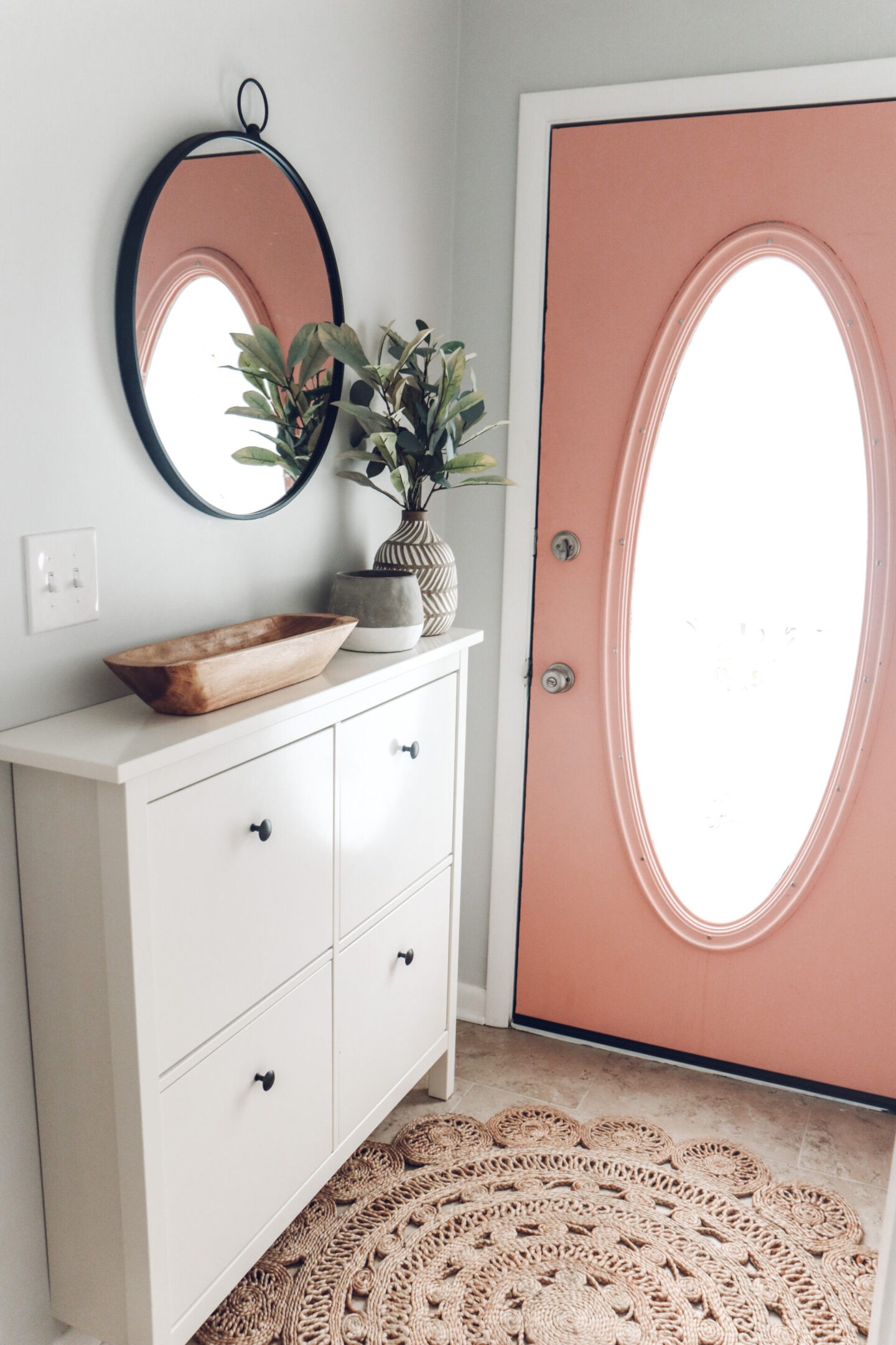 small entryway pink door